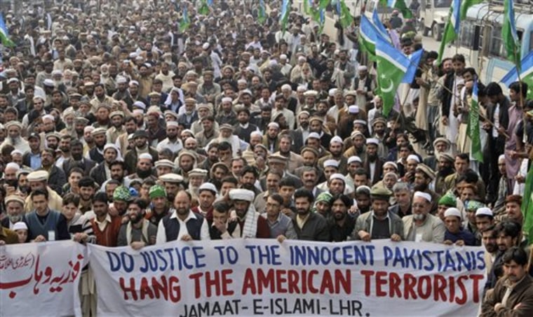 Supporters of Pakistani religious party Jamat-e-Islami attend a rally on Tuesday against Raymond Allen Davis, a U.S. consulate employee suspected in a shooting in Lahore.